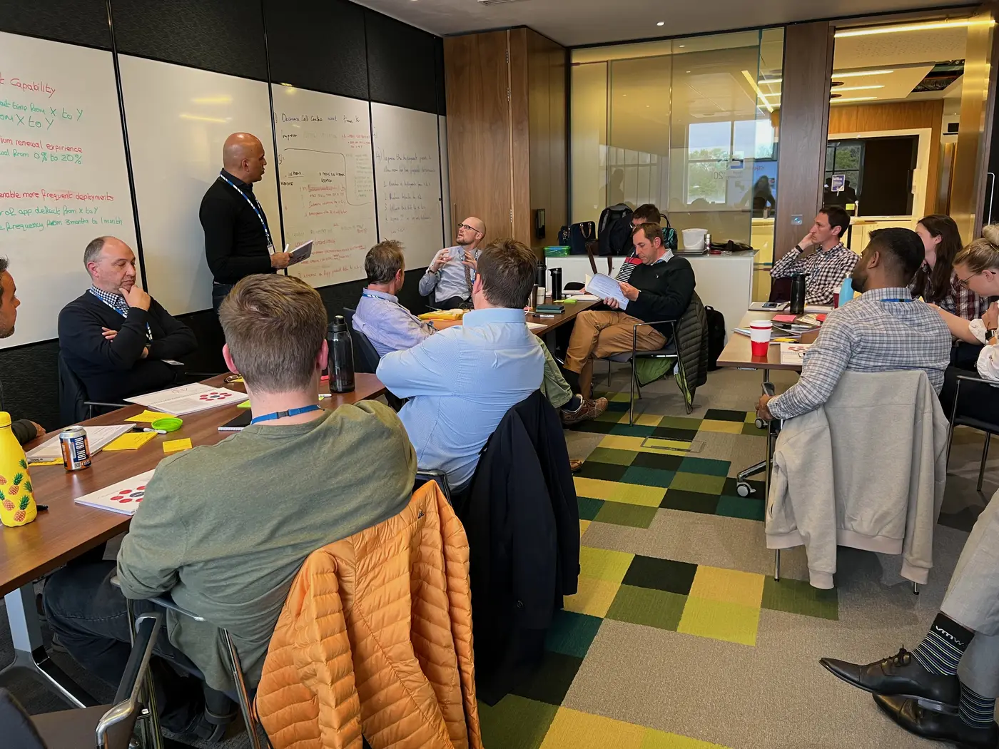 Leaders building and refining their OKRs together in a facilitated design session